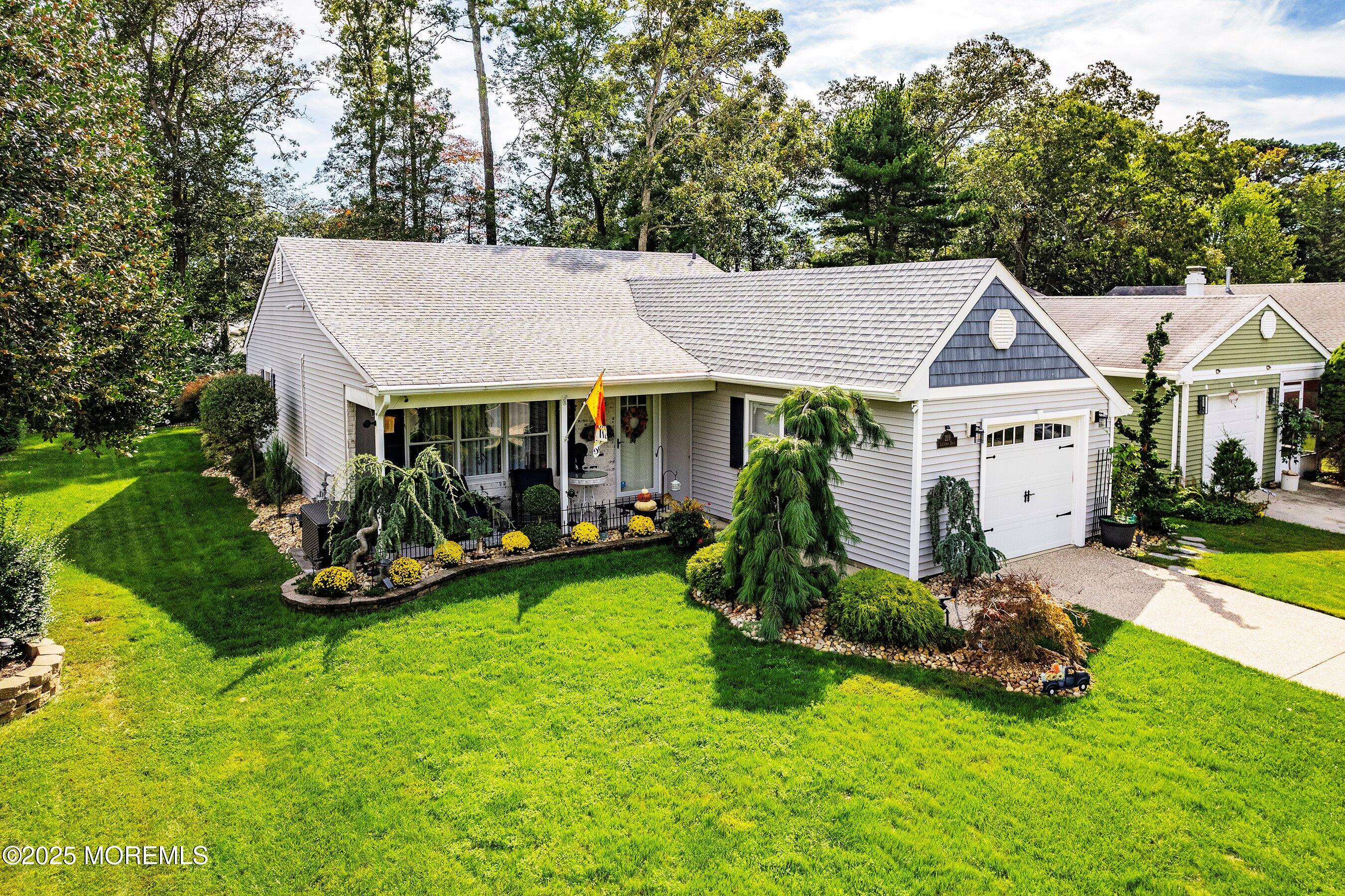 219 Lexington Drive Little Egg Harbor, NJ 08087 - Photo 3 of 30 a view of a house with backyard