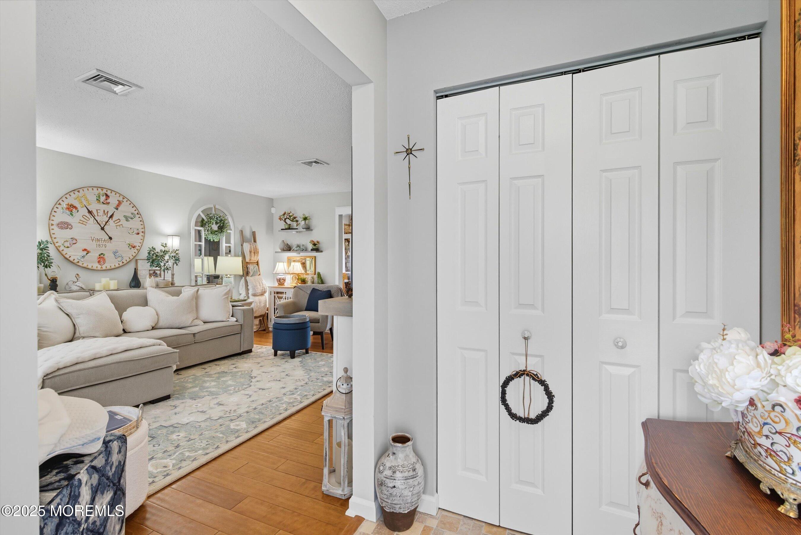 219 Lexington Drive Little Egg Harbor, NJ 08087 - Photo 4 of 30 a living room with furniture and wooden floor