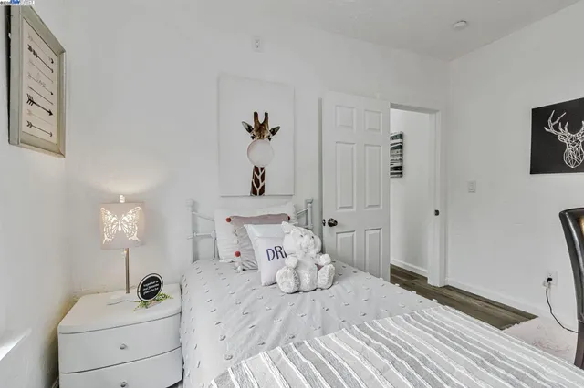 a bathroom with a sink toilet vanity and bathtub