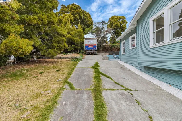 a house with trees in front of it