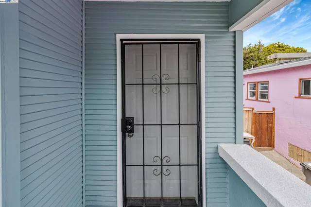 a living room with furniture a window and a fireplace