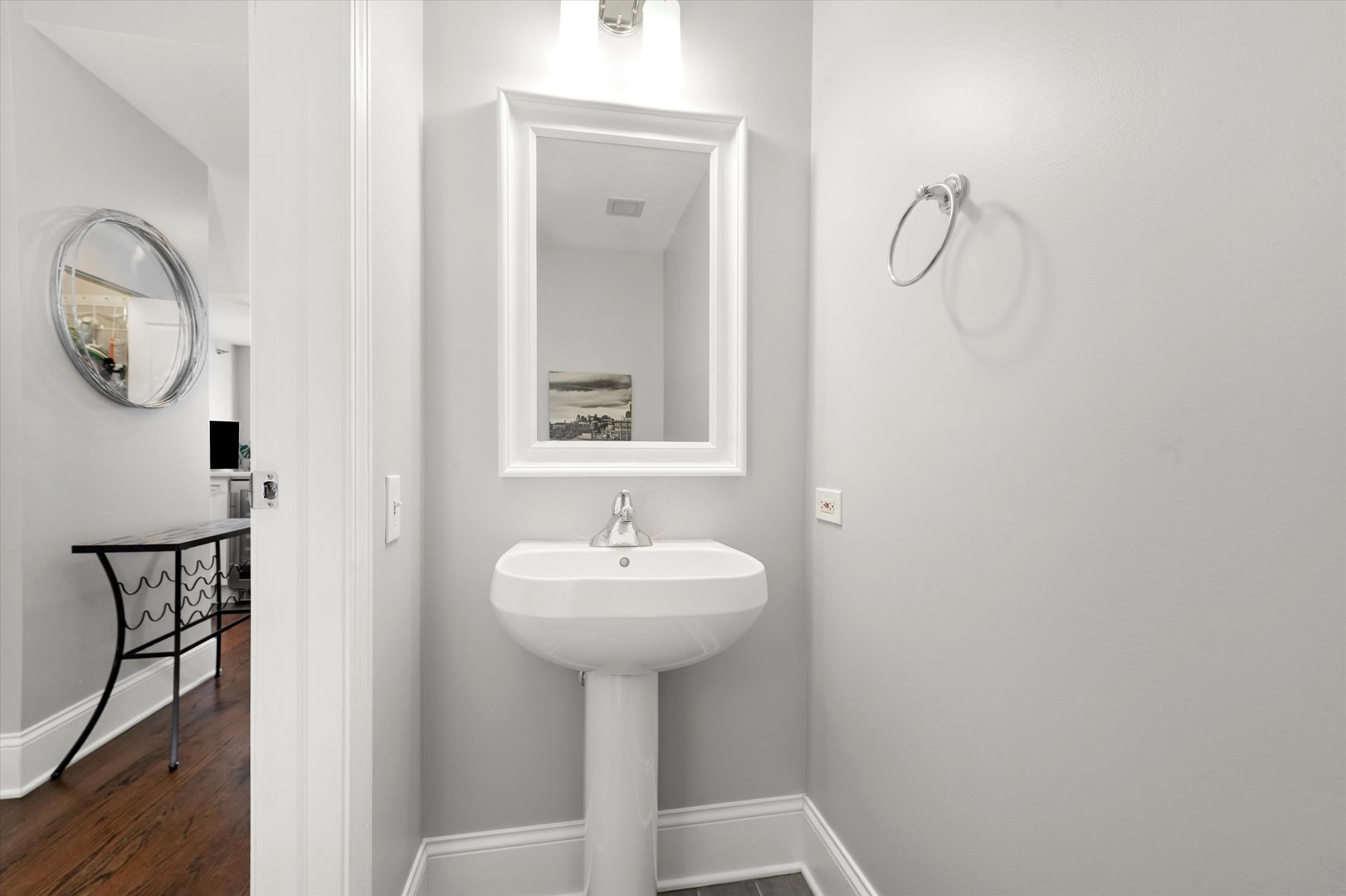 1515 South Prairie Avenue, Unit 910 Chicago, IL 60605 - Photo 20 of 32 a bathroom with a sink a mirror and a toilet