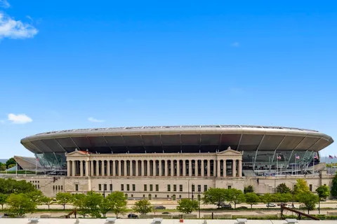 a view of a big house with a yard