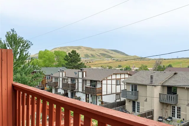 a view of a balcony with an outdoor space