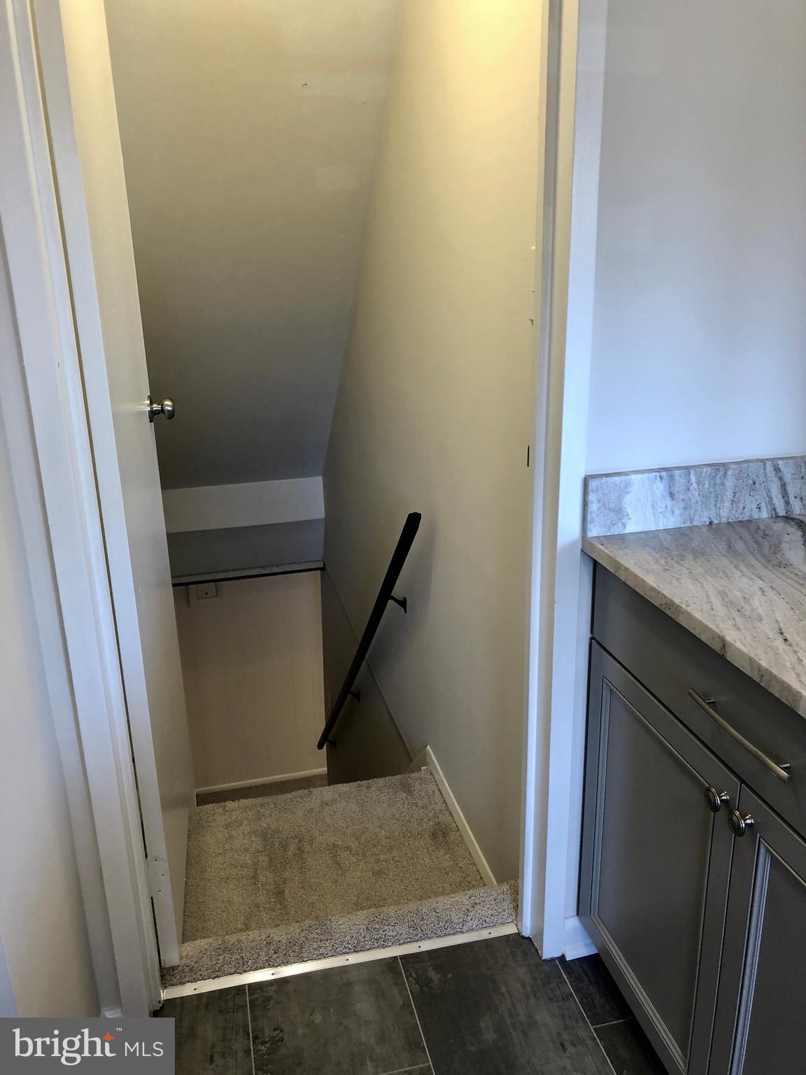 702 Kingston Road Baltimore, MD 21220 - Photo 10 of 30 Stairs to partially finished basement
