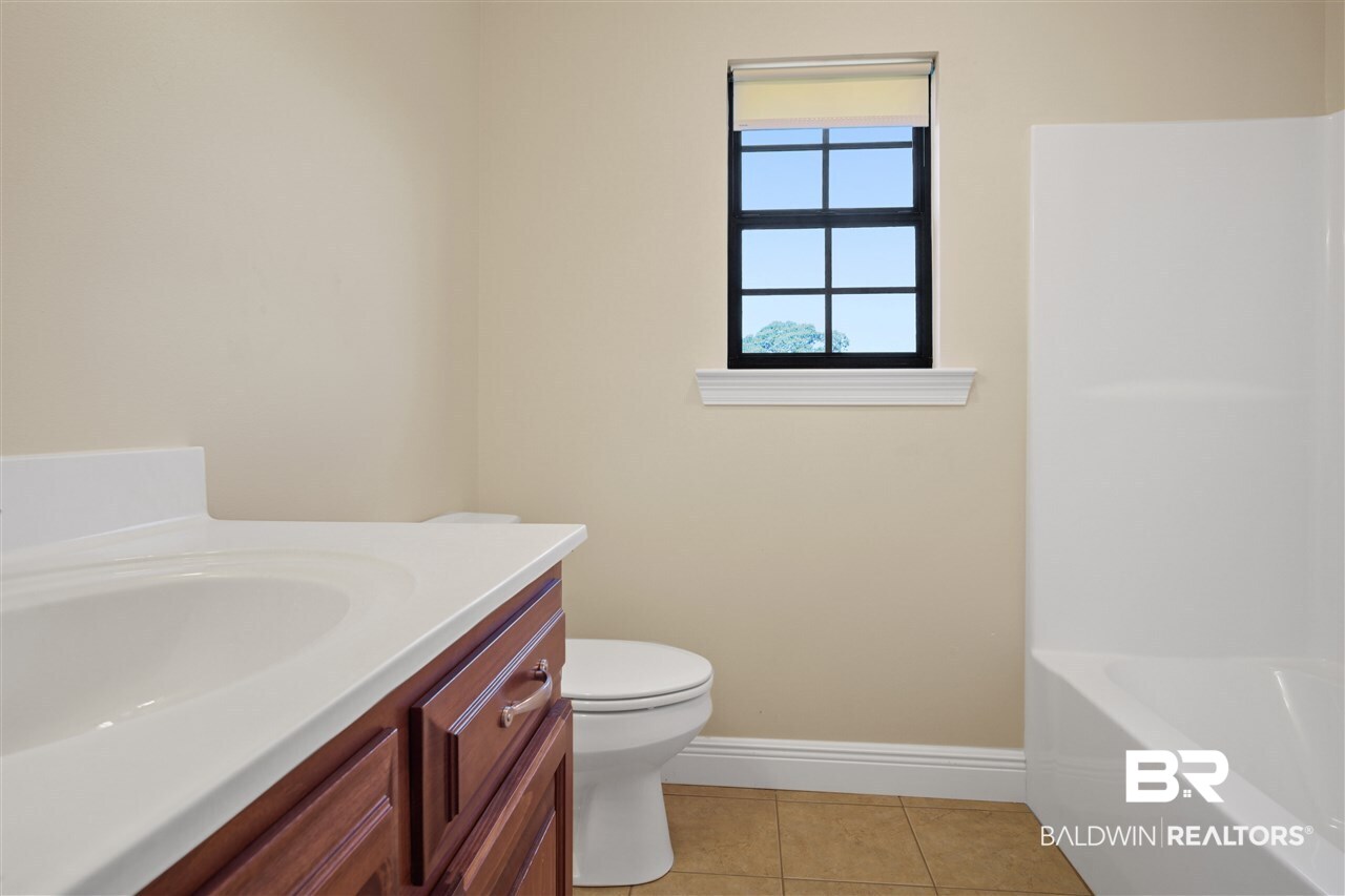 7785 Cuss Fork Road Wilmer, AL 36587 - Photo 25 of 38 Upstairs Full Bathroom, Tile Flooring