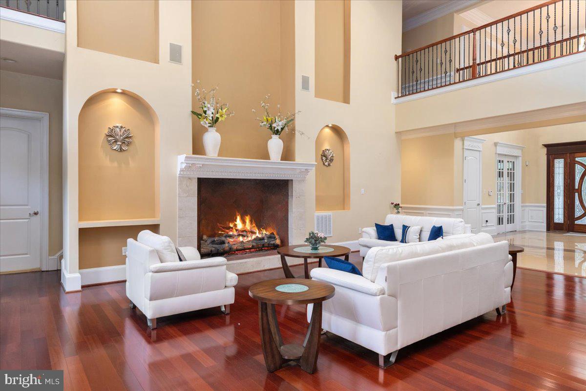 11846 Chapel Road Clifton, VA 20124 - Photo 10 of 143 Elegant living space with a cozy fireplace.