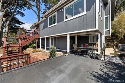 a view of a house with a patio