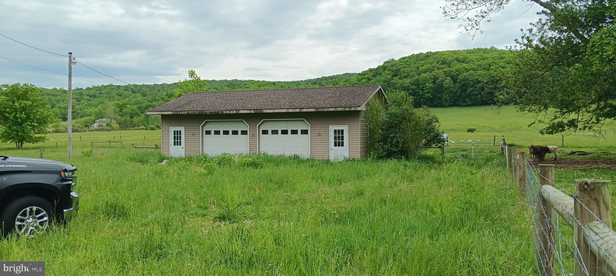 a house view with a garden space