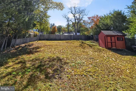 a house with trees in front of it