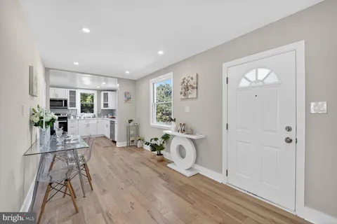 a view of a living room and dining room