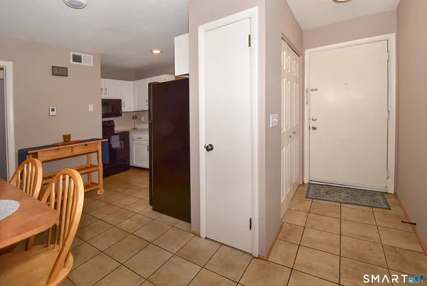 a kitchen with stainless steel appliances a refrigerator and a stove