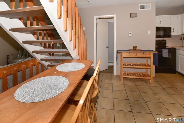 a kitchen with stainless steel appliances a refrigerator and a sink
