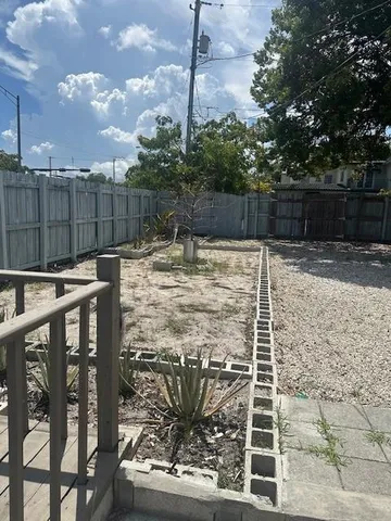 a view of a roof deck with couches