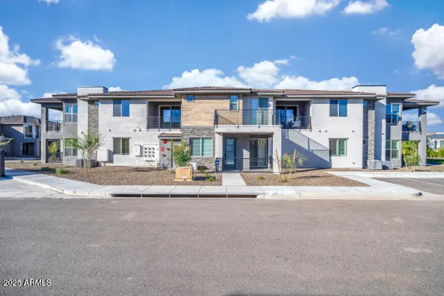 a front view of a building with a fountain and a fireplace