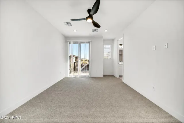 a bathroom with a double vanity sink mirror and shower