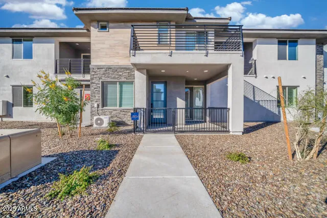a front view of a house with a porch