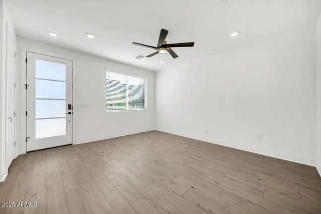 a view of a kitchen with a dishwasher and a refrigerator