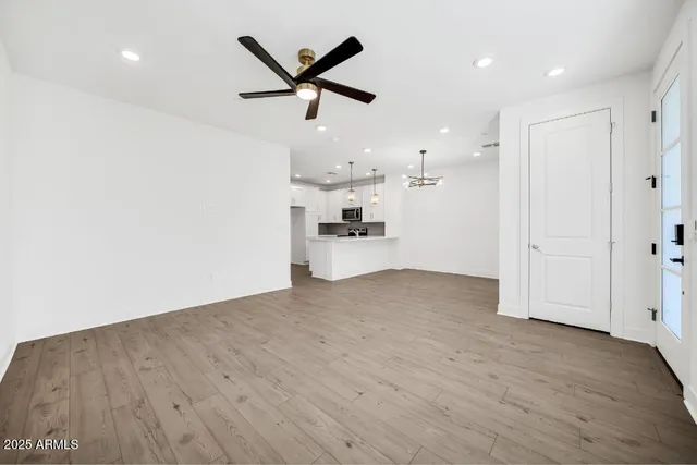 a view of entryway with wooden floor