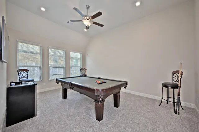 a view of a workspace with furniture