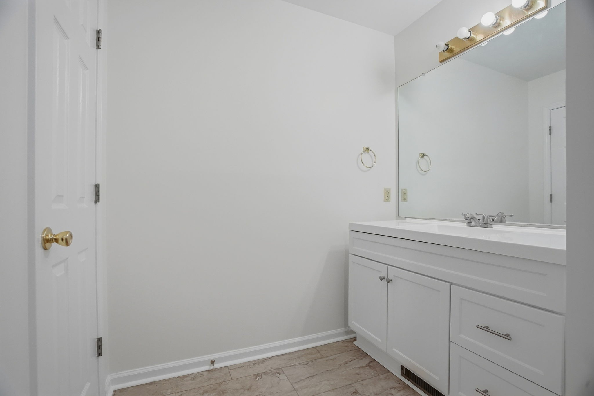 230 Woodruff Road Adams, TN 37010 - Photo 19 of 36 a bathroom with a sink and mirror