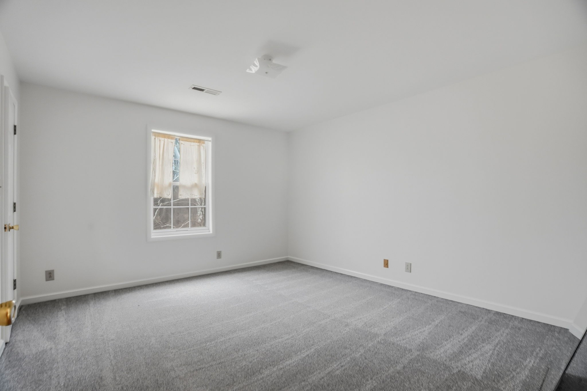 230 Woodruff Road Adams, TN 37010 - Photo 24 of 36 an empty room with a window