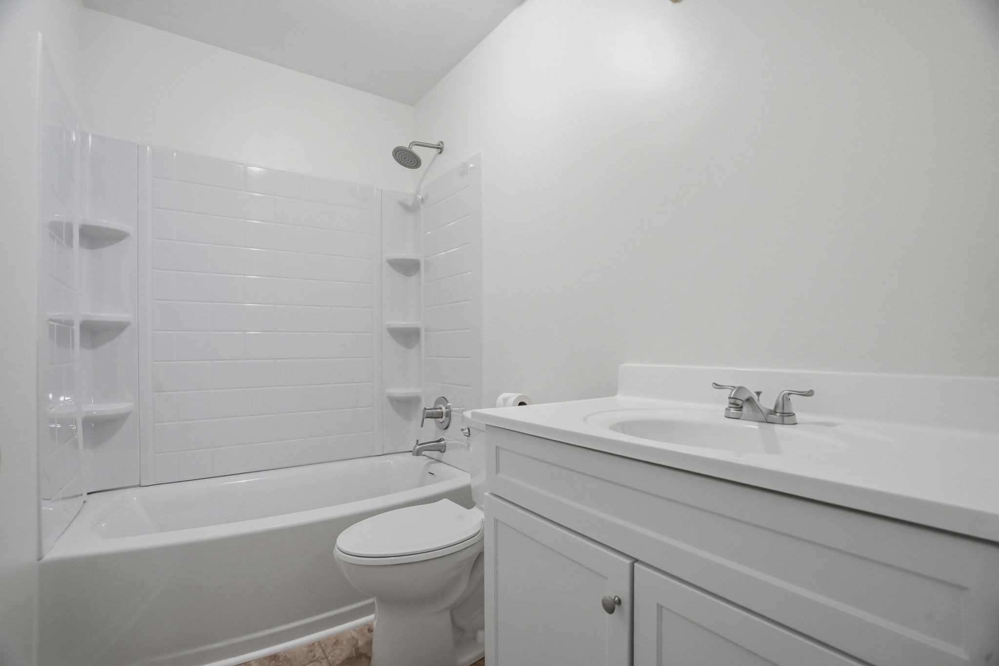 230 Woodruff Road Adams, TN 37010 - Photo 25 of 36 a bathroom with a sink a toilet and shower
