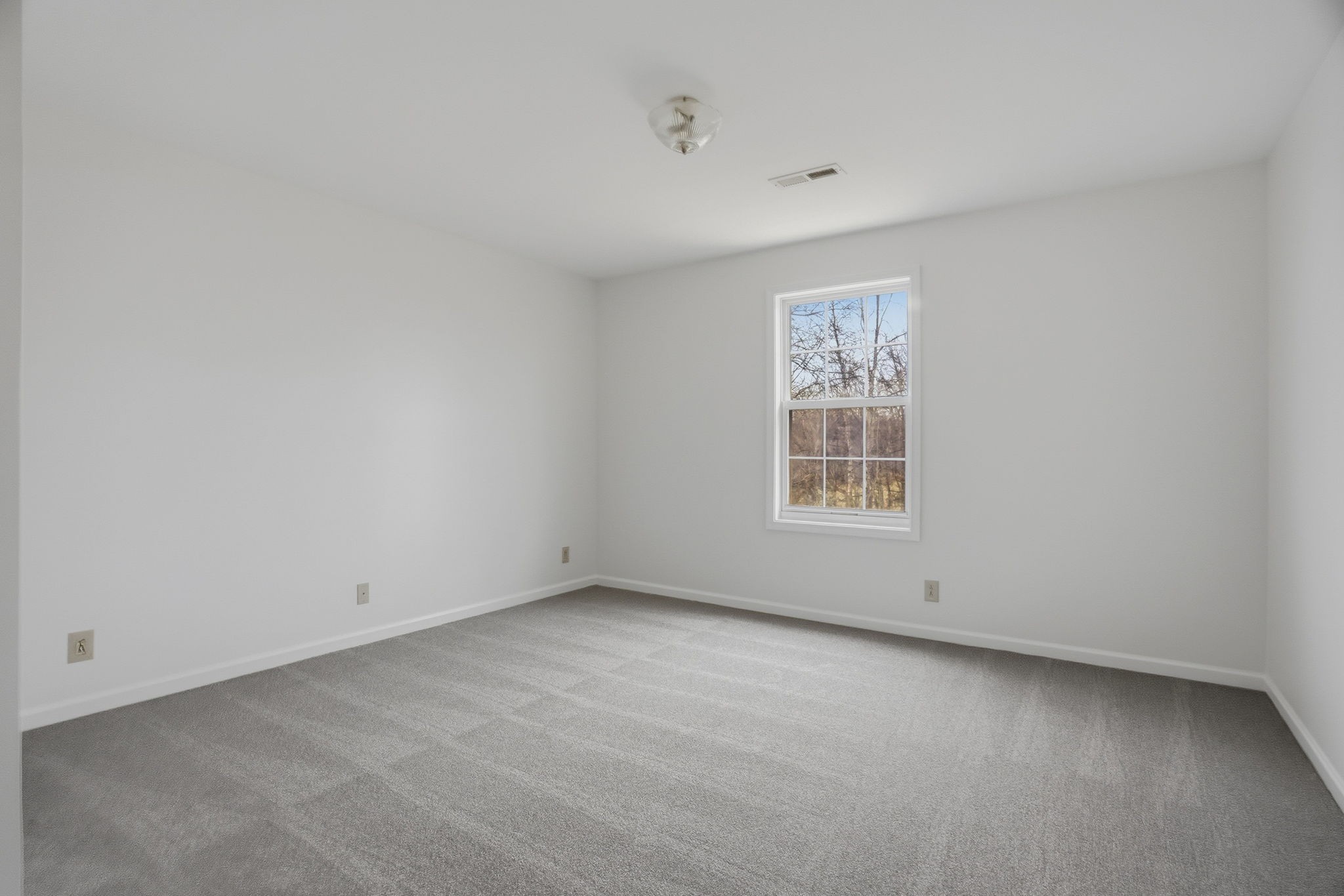 230 Woodruff Road Adams, TN 37010 - Photo 26 of 36 a view of an empty room with a window