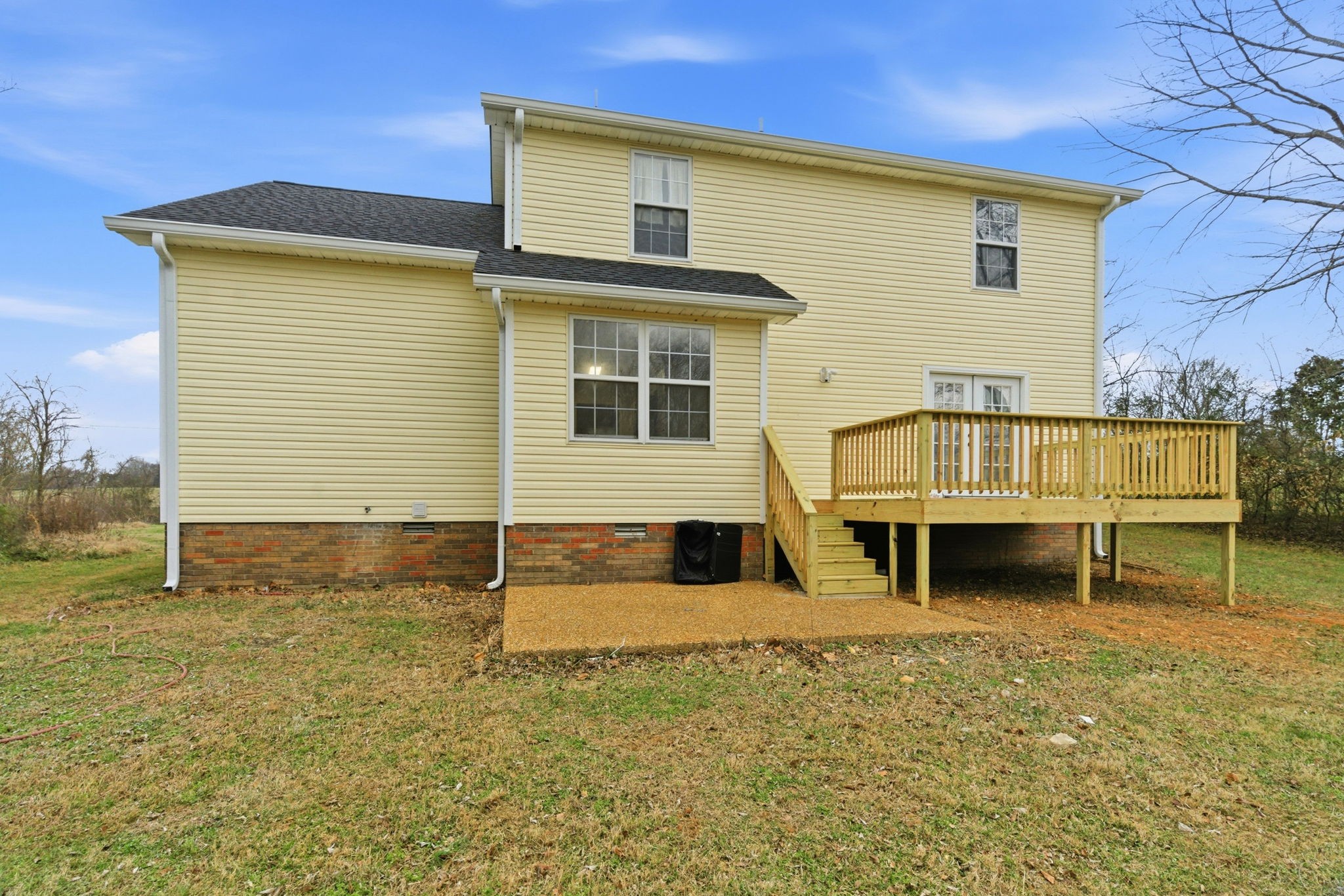 230 Woodruff Road Adams, TN 37010 - Photo 29 of 36 a front view of a house with garden