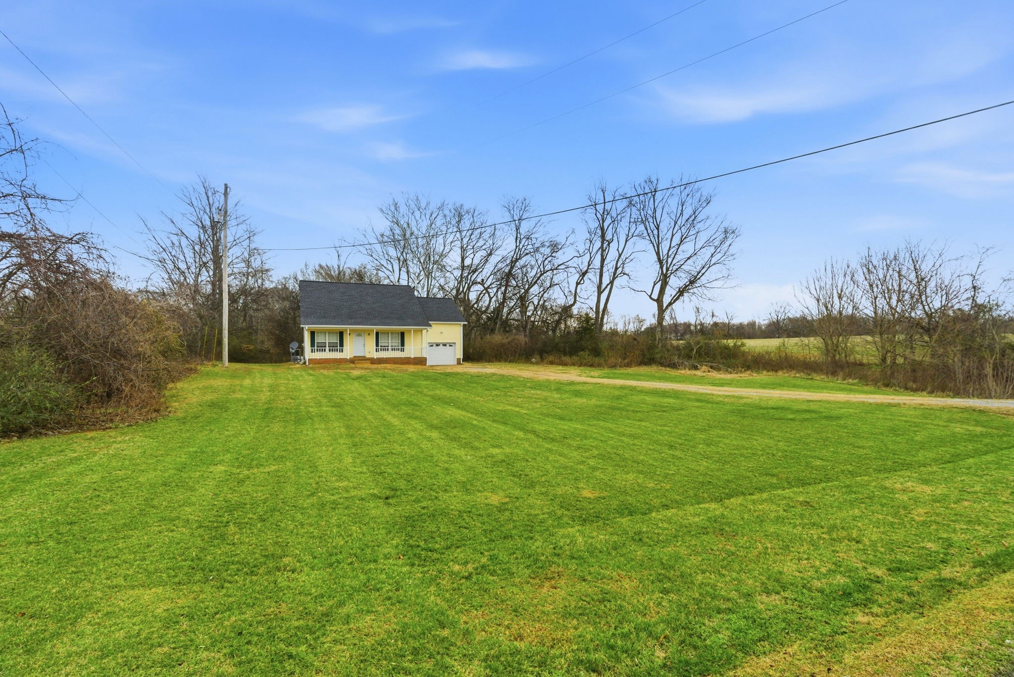 230 Woodruff Road Adams, TN 37010 - Photo 7 of 36 a view of a garden with an outdoor space