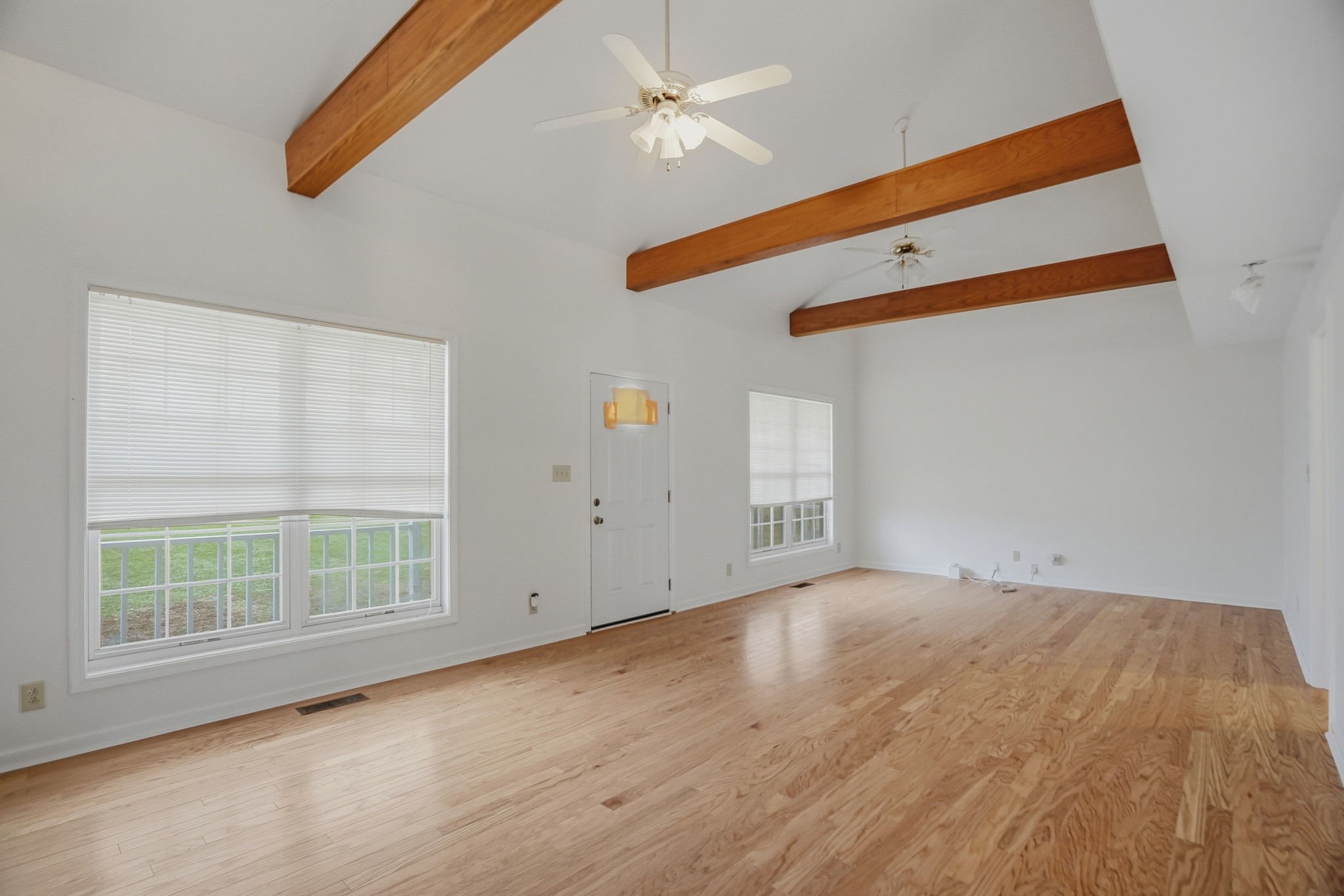 230 Woodruff Road Adams, TN 37010 - Photo 10 of 36 an empty room with a window and ceiling fan