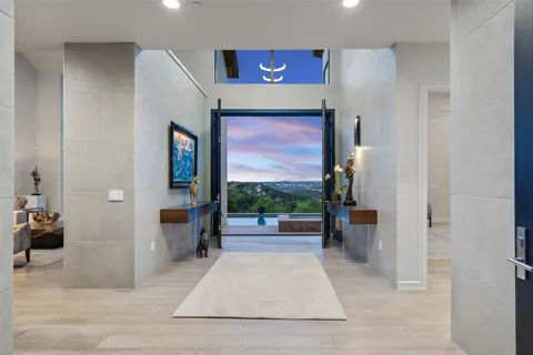 a living room with fireplace furniture and a flat screen tv