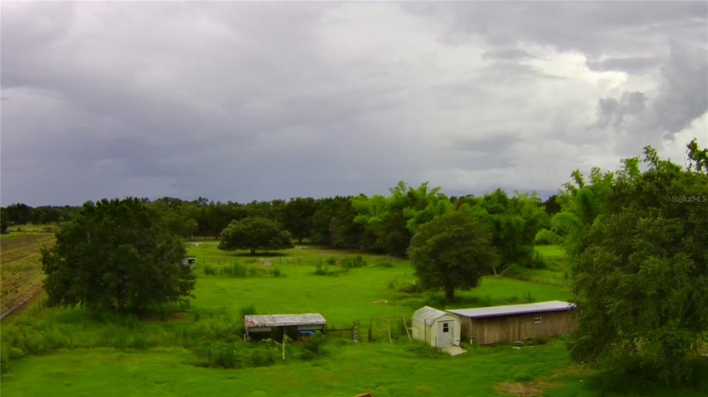 a view of a golf course with a garden
