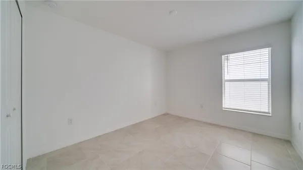 an empty room with a window