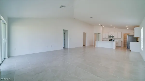 a view of a kitchen with a sink