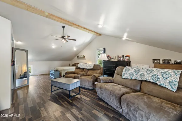a view of a livingroom with furniture and a couch