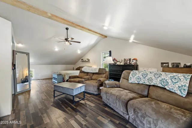 a view of a livingroom with furniture and a couch