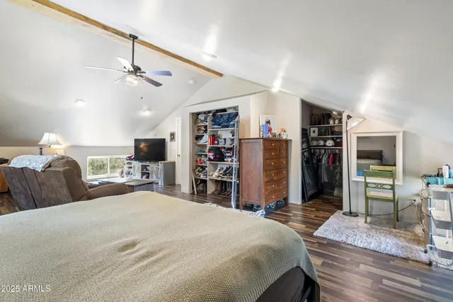 a bathroom with a sink a toilet and a window