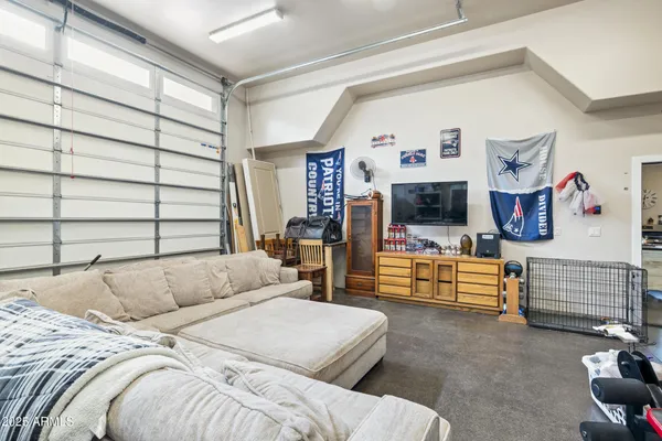 a view of a chairs and table in the garden