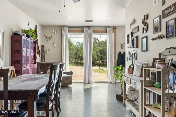an aerial view of a house with outdoor space