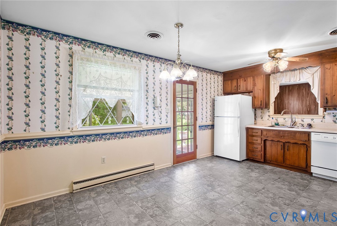 3513 Union Branch Road Petersburg, VA 23805 - Photo 12 of 32 a kitchen with refrigerator and window