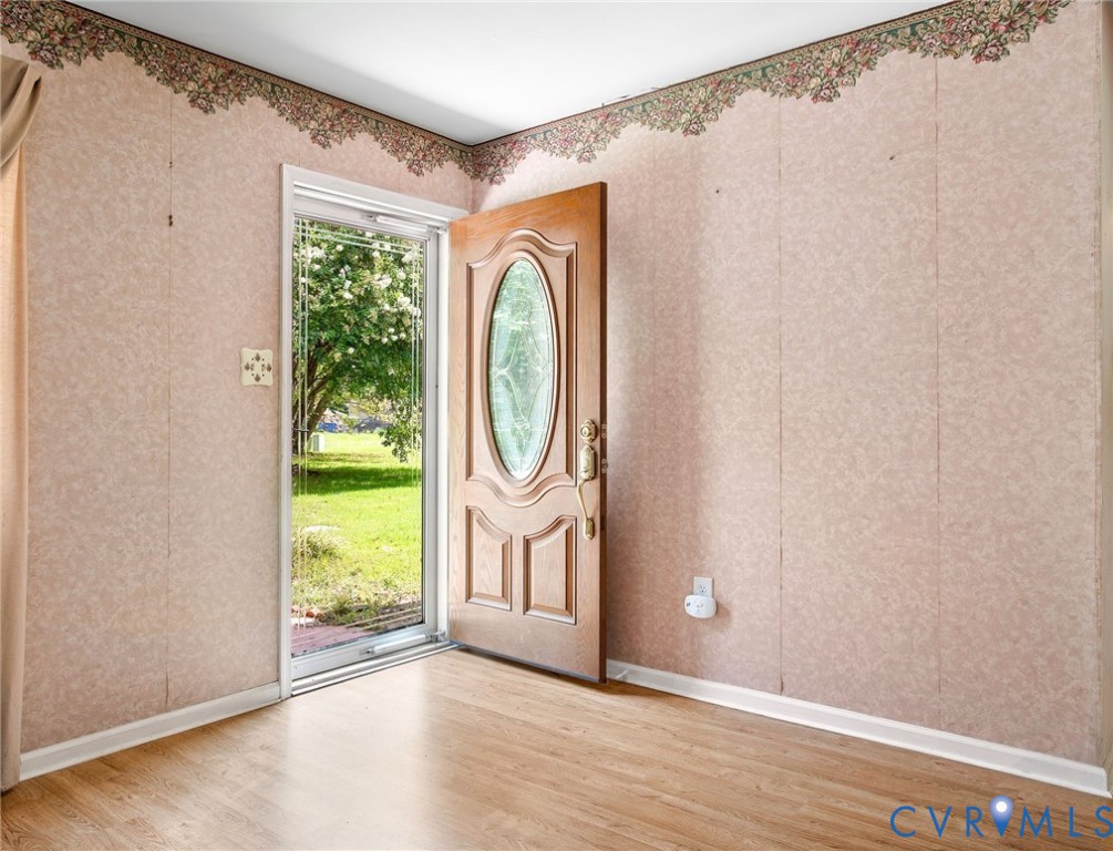 3513 Union Branch Road Petersburg, VA 23805 - Photo 5 of 32 a view of front door with washer and dryer