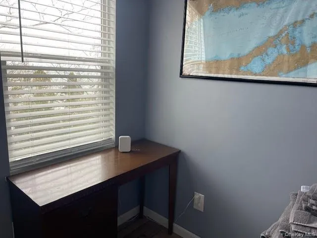 a view of a window with a desk