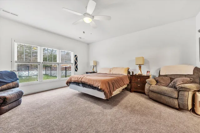 a bathroom with double sink and a mirror