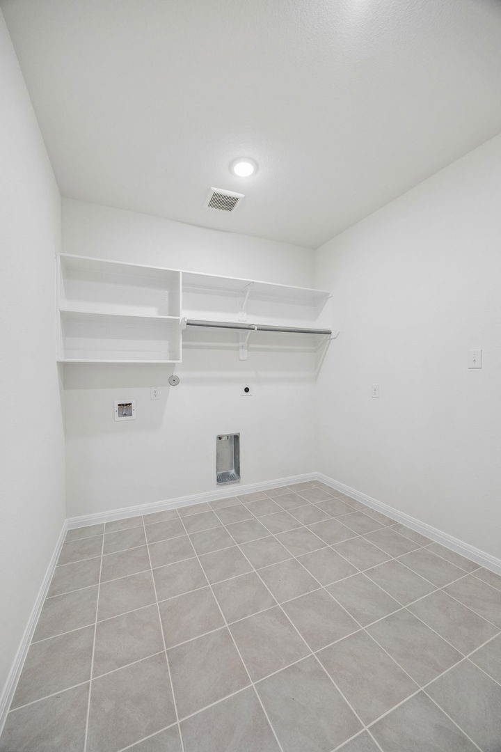 31012 Rena Coast Drive Huffman, TX 77336 - Photo 16 of 32 Utility Room in the Magnolia home plan by Trophy Signature Homes – REPRESENTATIVE PHOTO