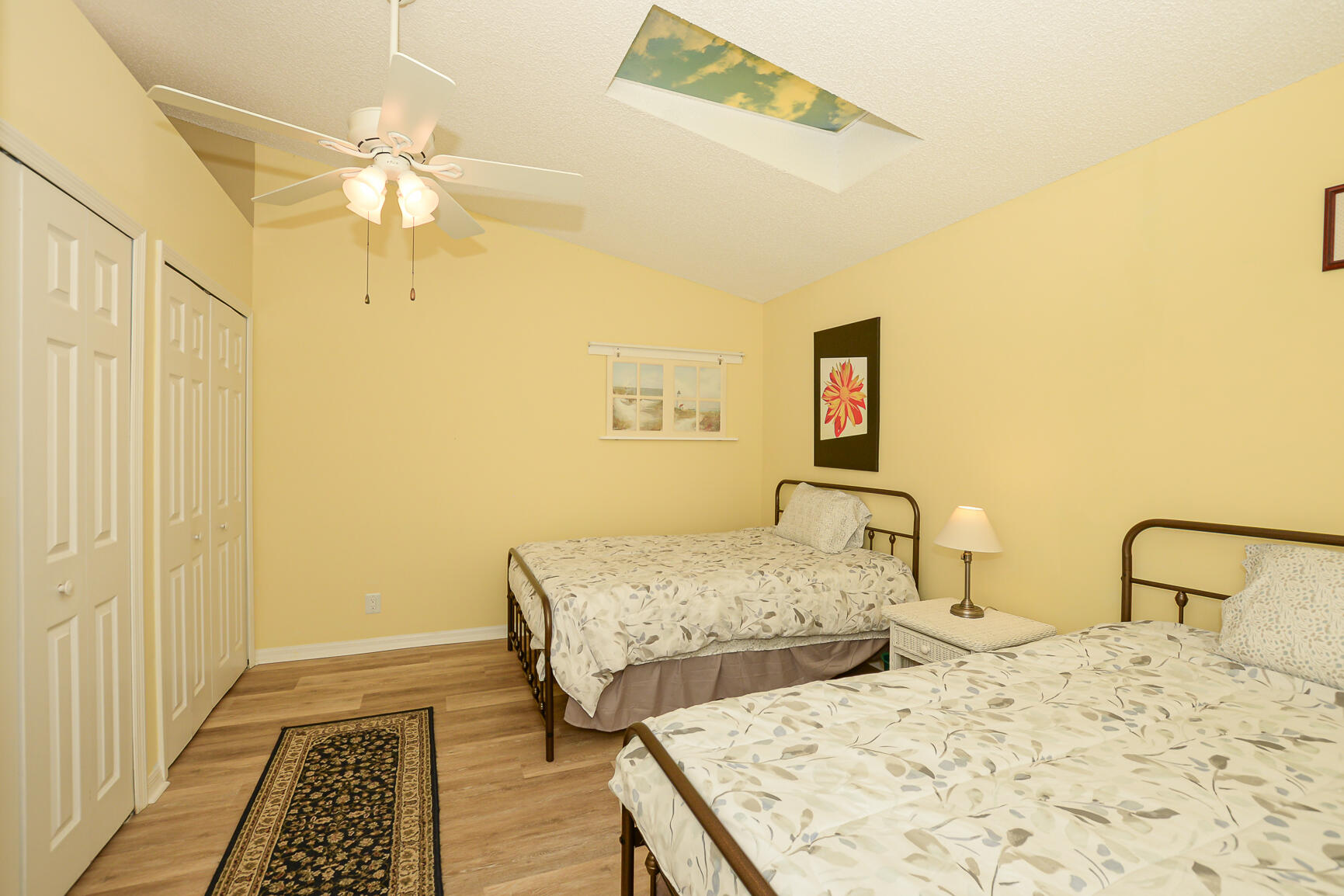 4064 Gator Trace Road Fort Pierce, FL 34982 - Photo 16 of 37 a bedroom with double bed and a window