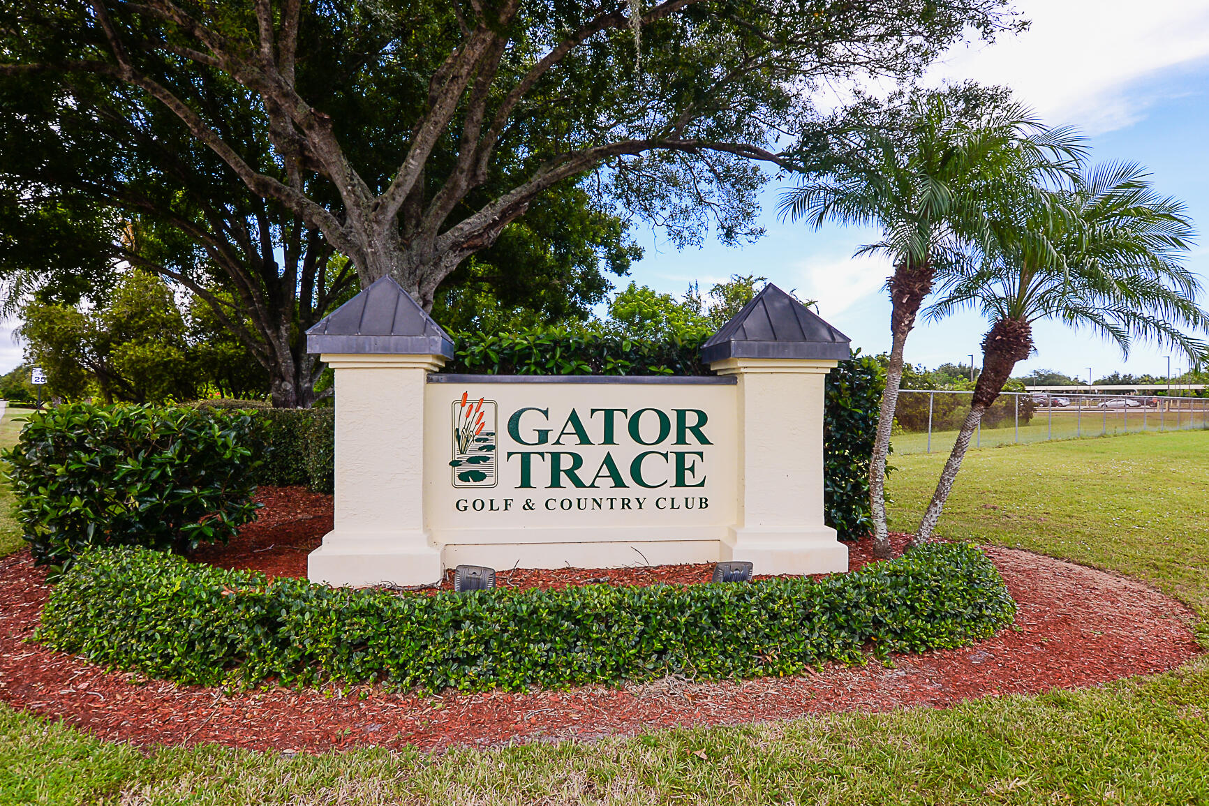 4064 Gator Trace Road Fort Pierce, FL 34982 - Photo 29 of 37 a sign on the side of the road