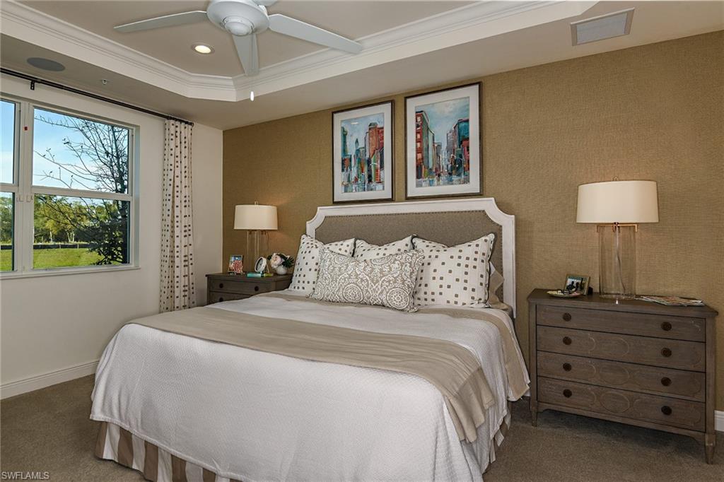 2665 Seychelles Circle, Unit 1902 Naples, FL 34112 - Photo 11 of 19 a bedroom with a bed dresser and a window
