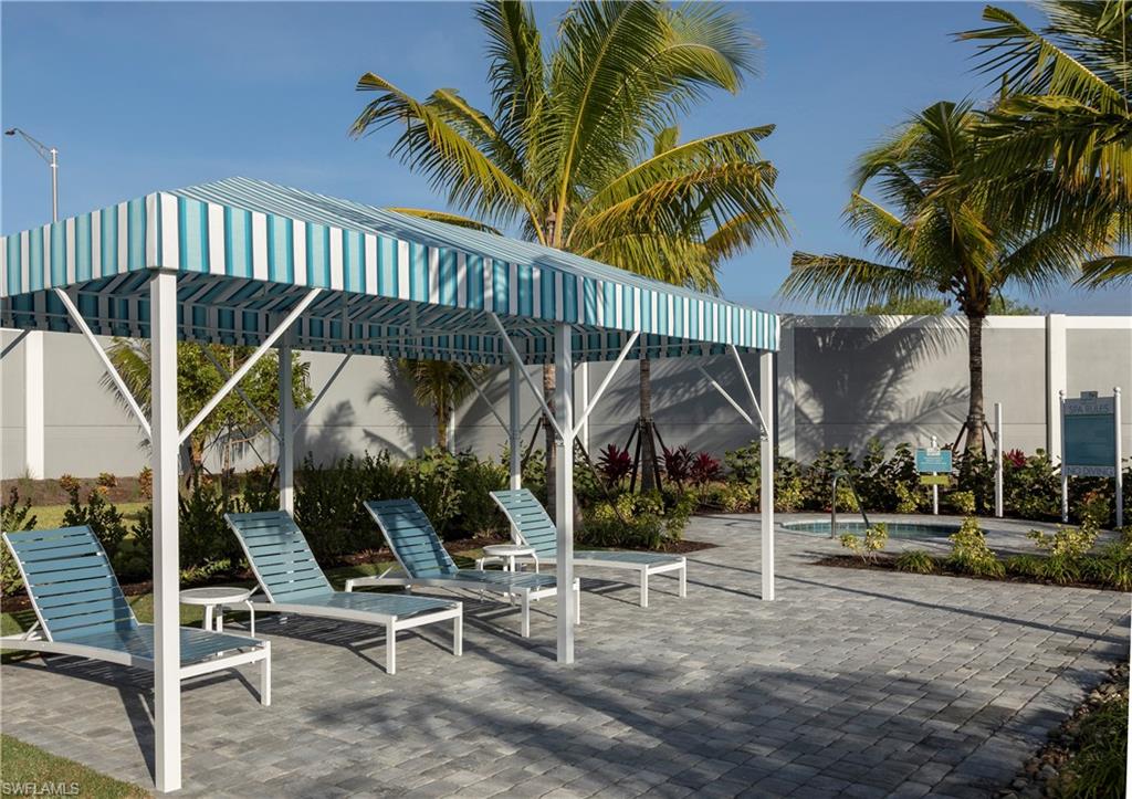 2665 Seychelles Circle, Unit 1902 Naples, FL 34112 - Photo 19 of 19 a view of outdoor space with porch
