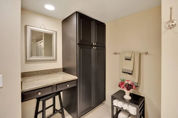a room that has a table and chair in it